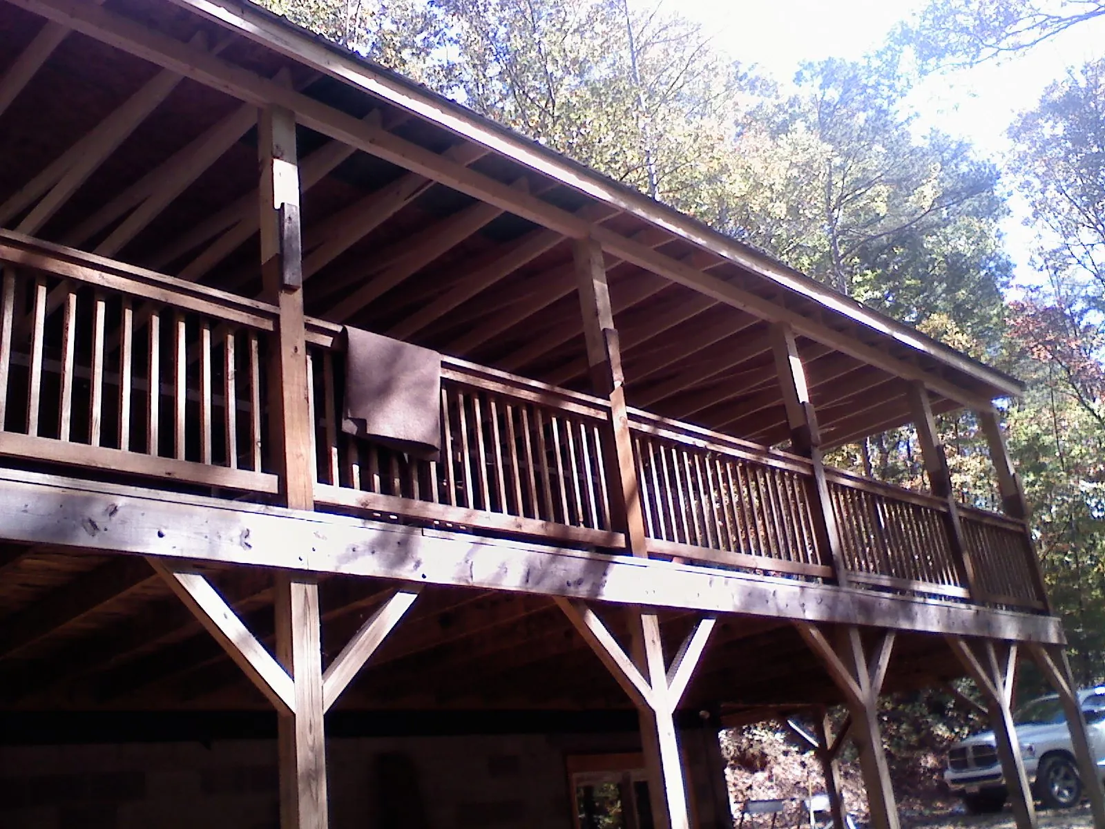 Timber framing under a new elevated porch and deck — Roof Leak Repair in Haleyville by Roofing Brothers